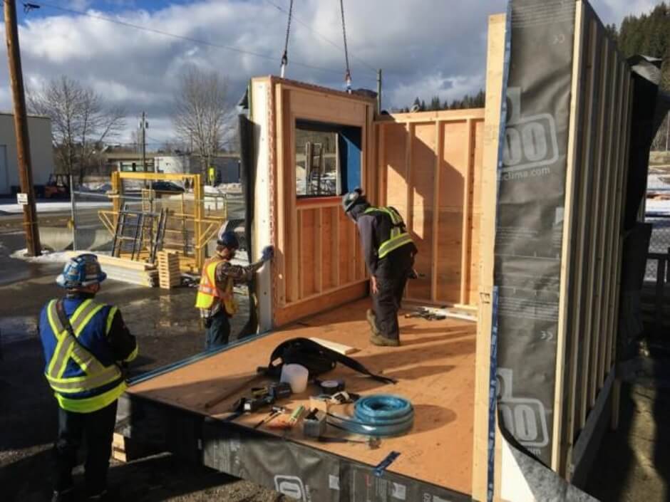 wall panel being craned into place