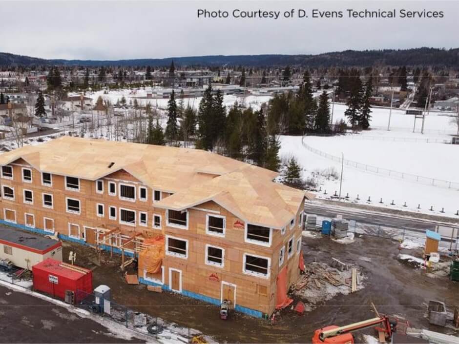 aerial view of large apartment before siding and roofing is applied